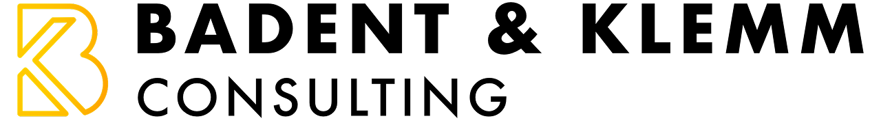Yellow outlined K logo on a black background.