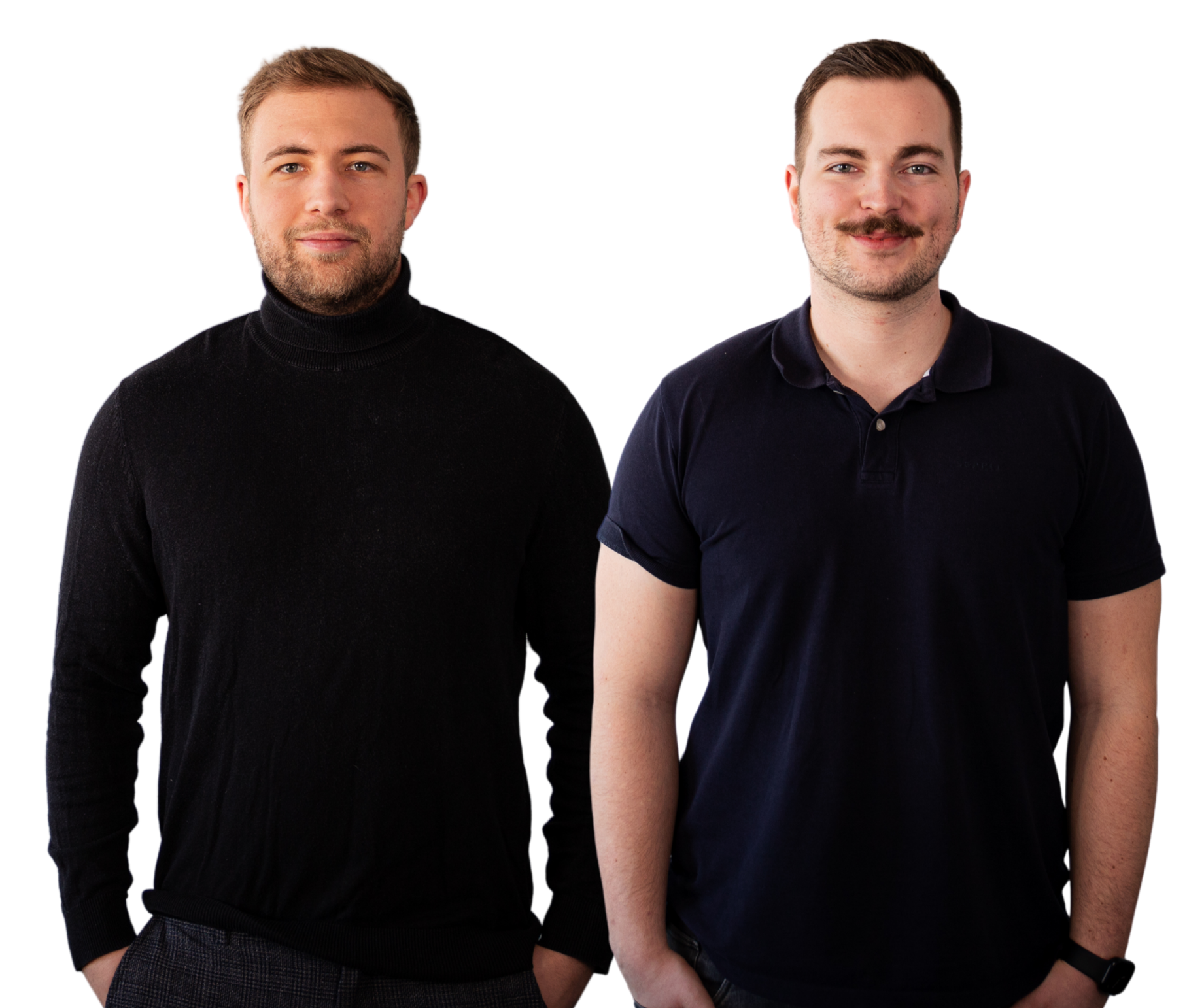 Two men stand side by side against a black background, both wearing dark casual tops and looking at the camera with neutral expressions.
